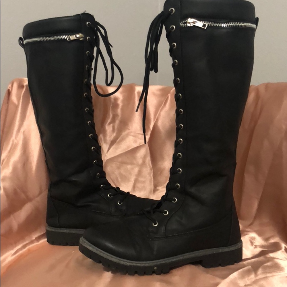 Knee high black zip and lace combat boots